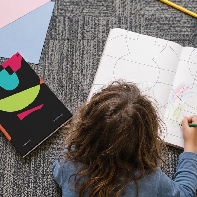 Child drawing on Oligo coloring book